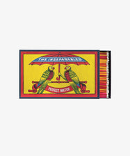 Box of Matches by Archivist Gallery. Rectangular novelty matchbox printed with colorful illustrated parrots and umbrella.