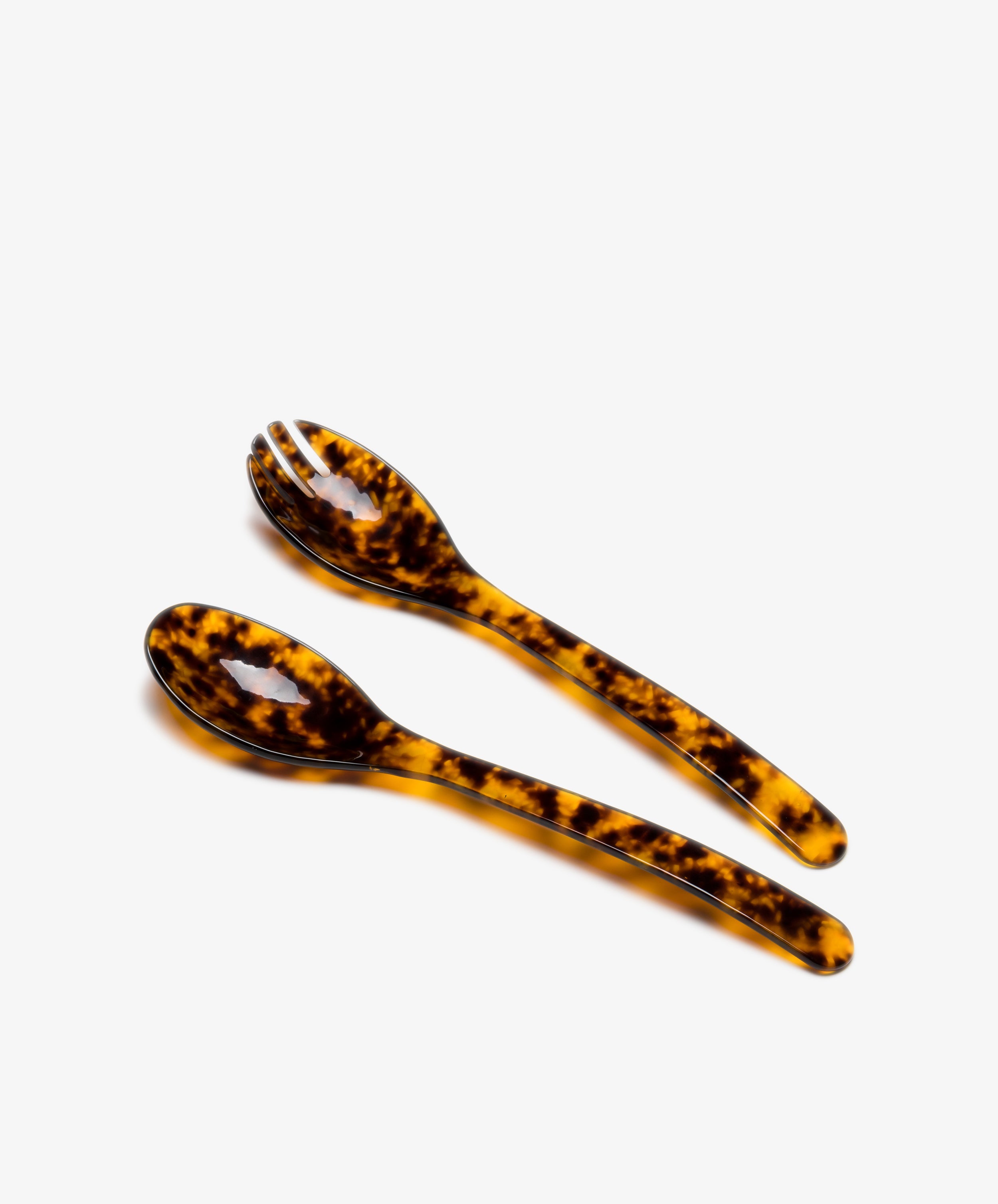 Bestia Serving Set. Fork and spoon serving utensils in tortoise-patterned acrylic.