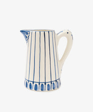 Jorge Jug. Glazed ceramic pitcher in white with blue stripes and accents.