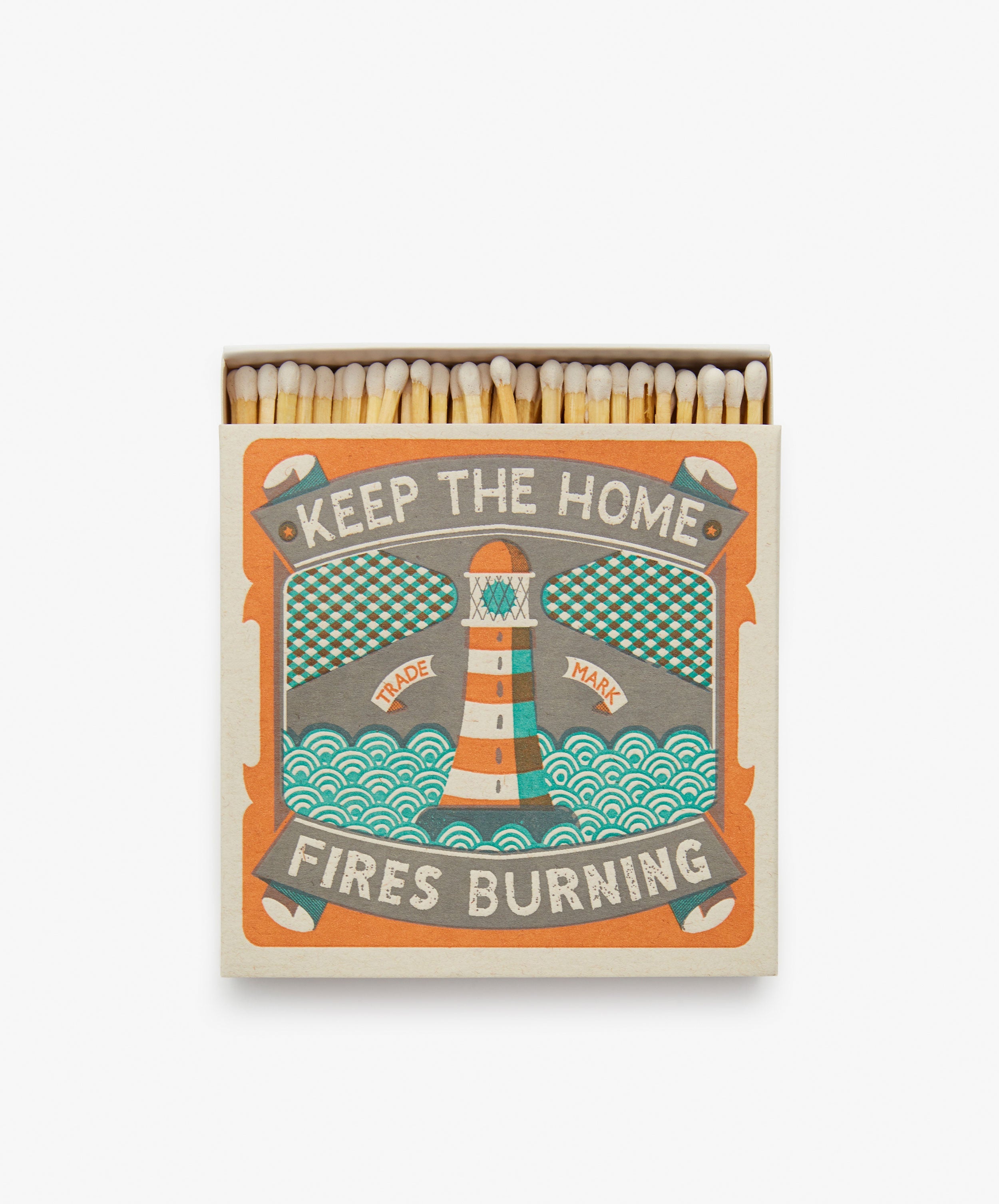 Keep the Home Fires Burning, Luxury Matches. Teal and orange box with lighthouse illustration and matches peeking out.