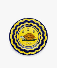 Palio Dinner Plate. Glazed ceramic in yellow and navy designs with tortoise motif.
