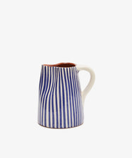 Natalia Milk Jug. Blue and white striped glazed terracotta mini pitcher with white handle.