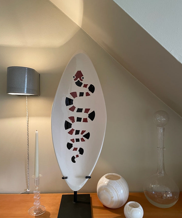 snake motif on plate