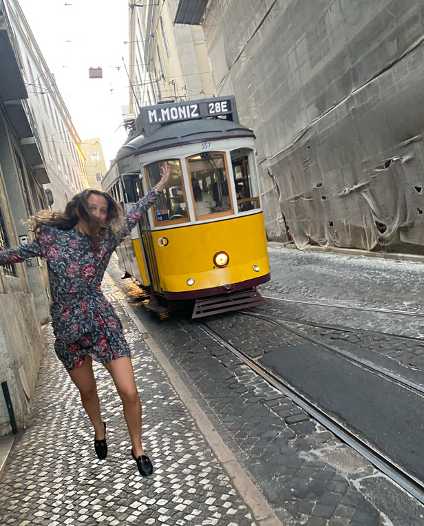 woman jumping on street