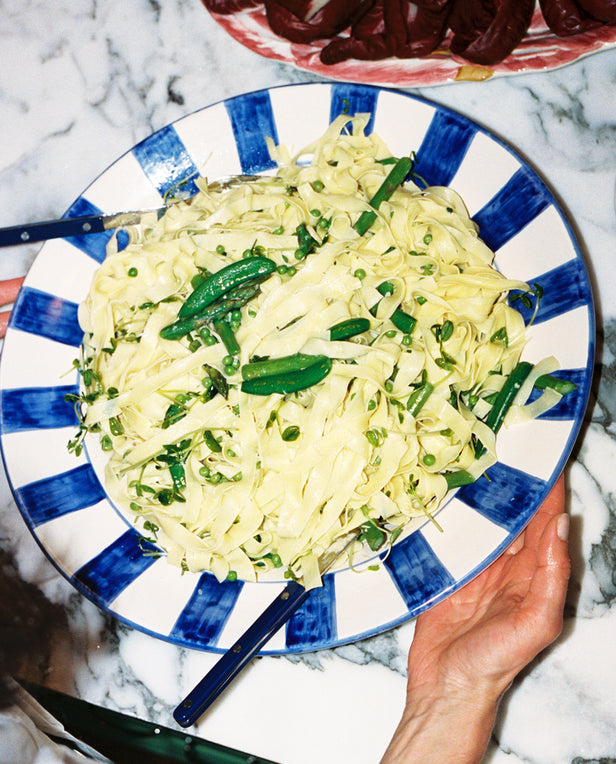 fettuccini pasta with vegetables in it