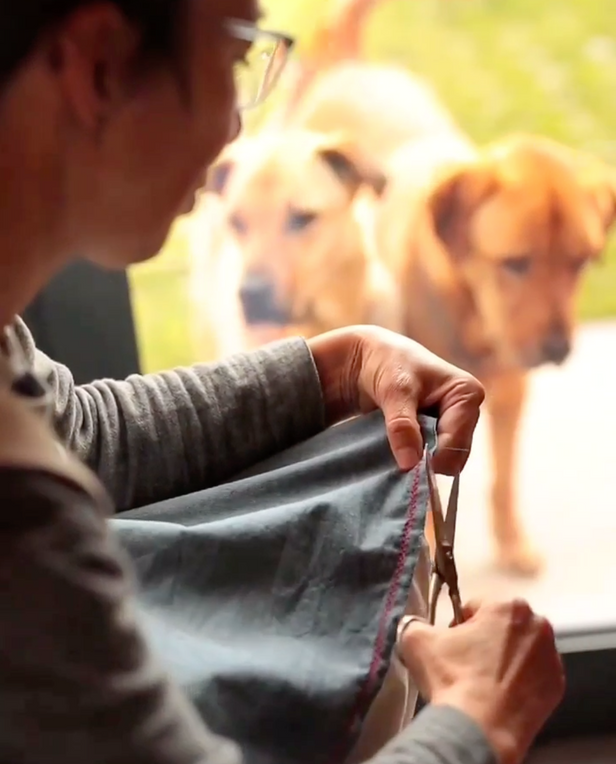 woman cutting fabric