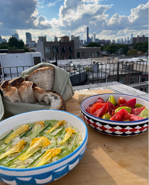 two plates with food and bread