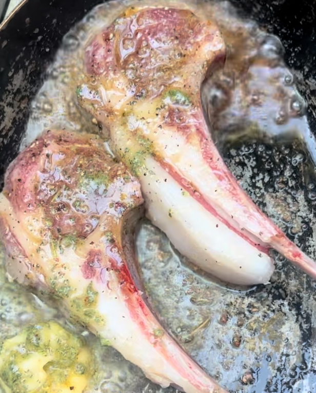 raw meat cooking in pan