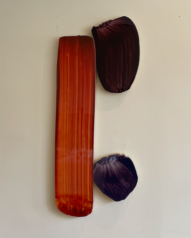 red and purple art on wall