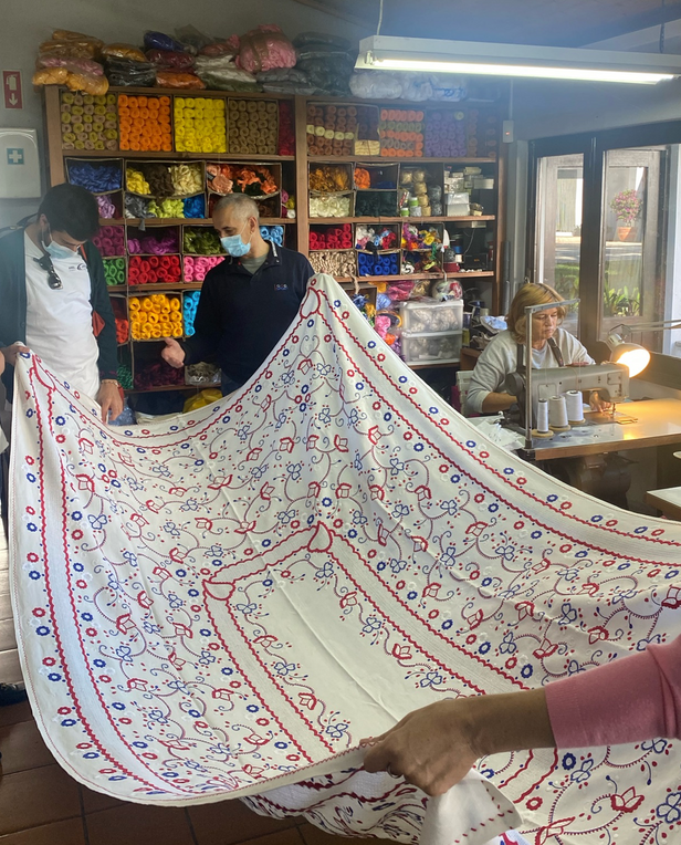 man holding tablecloth