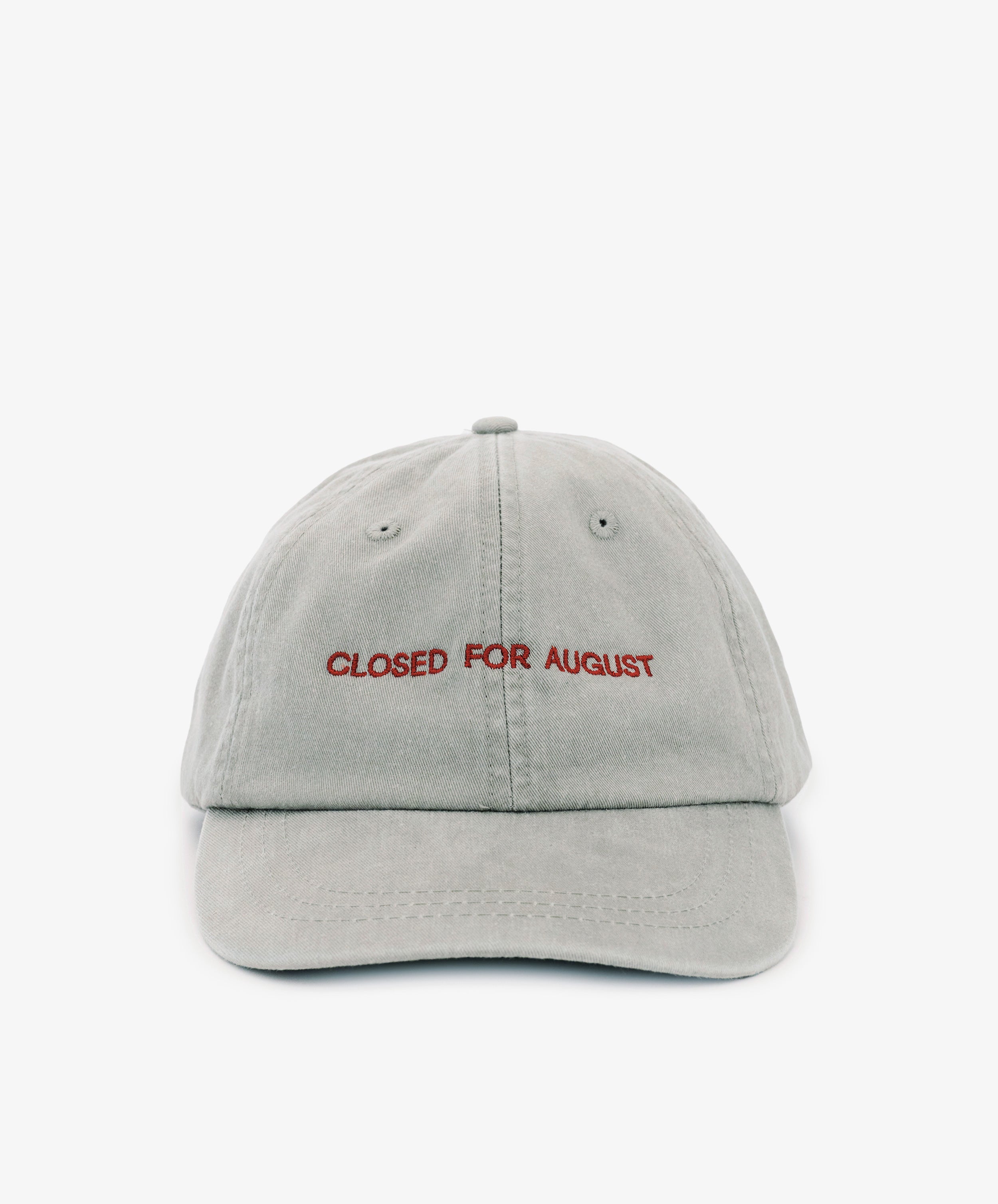 The Closed for August Cap is a light gray sun protection cap featuring 