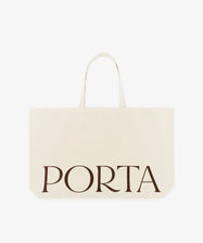 The PORTA Canvas Tote Bag is a spacious cream-colored tote with two handles and bold black 