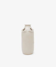 The Mini Candlehat Vase is a tall, off-white ceramic piece featuring a narrow neck and decorative loops near the top, inspired by a 17th-century vessel, shown against a plain white background.
