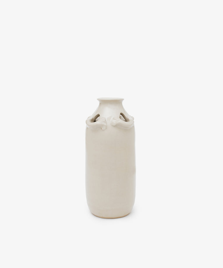 The Mini Candlehat Vase is a tall, off-white ceramic piece featuring a narrow neck and decorative loops near the top, inspired by a 17th-century vessel, shown against a plain white background.