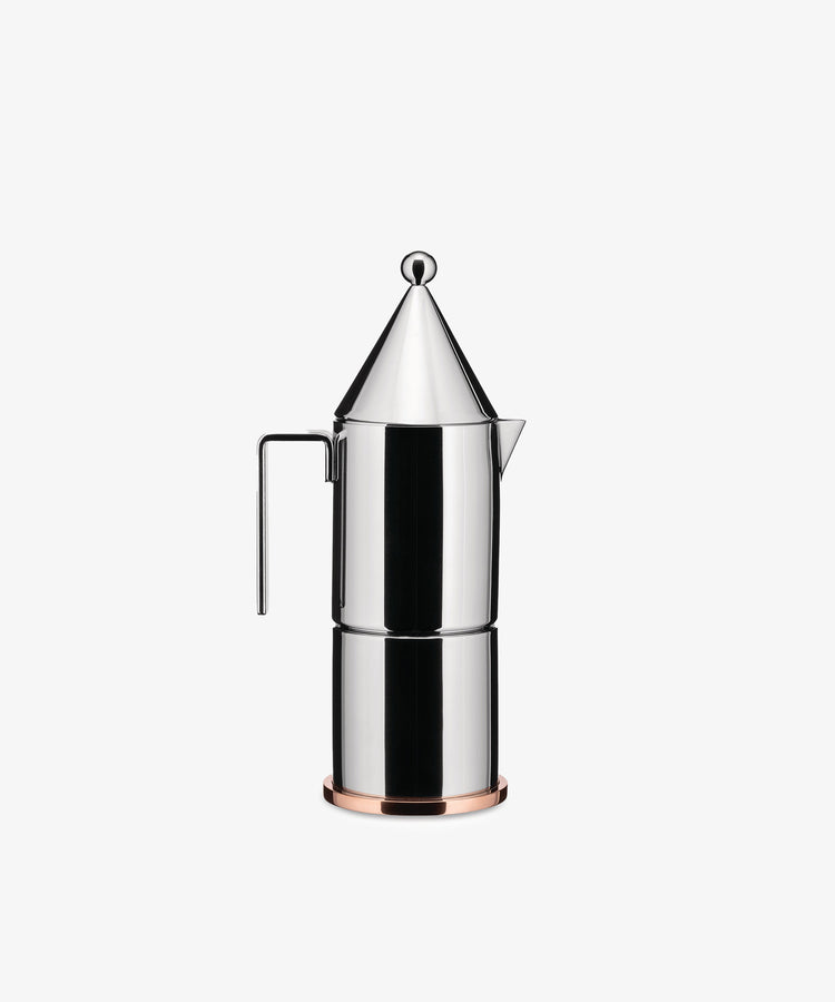 The La Conica Espresso Coffee Maker features a modern stainless steel design by Aldo Rossi, with a geometric cone-shaped lid and side handle, shown against a plain white background.