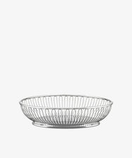 An oval wire basket with a shallow, open design is shown against a plain white background.