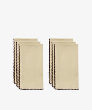 Four folded beige hand-finished napkins with dark espresso contrast stitch along the edges, arranged in two groups of two, on a white background.