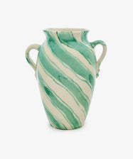The Ida Vase is a cream-colored ceramic piece featuring two handles and diagonal green swirl patterns, blending classic charm with a modern touch.