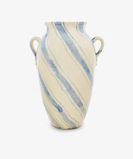 The Ida Vase is an amphora-shaped, cream-colored vase with two handles and diagonal blue streaks, ideal as a modern decorative accent for any space.