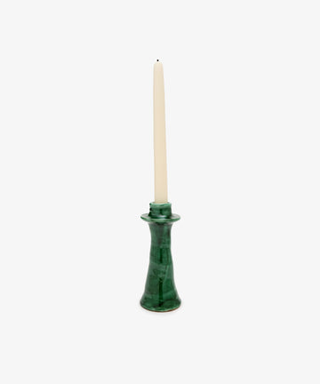Angelita Candleholder. Single pillar holder in layered green glazed ceramic with white taper candle.