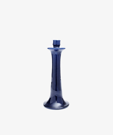 The Maria Candleholder is a glossy, dark blue handcrafted ceramic piece featuring a flared base and narrow neck, displayed against a plain white background.