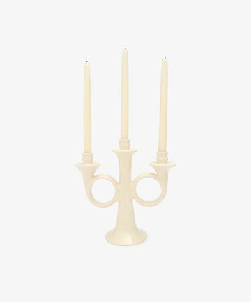 Loretta Candelabra. Ivory white glazed ceramic candle holder with three white taper candles.