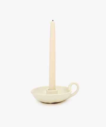 Balea Candle Holder. White glazed ceramic candleholder dish with small handle and white taper candle.