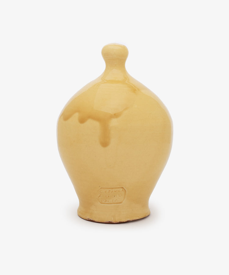 The Hugo Money Pot is a handcrafted ceramic money bank with yellow glaze, a rounded body, narrow base, and knobbed lid—ideal for saving coins. Displayed against a plain white background.
