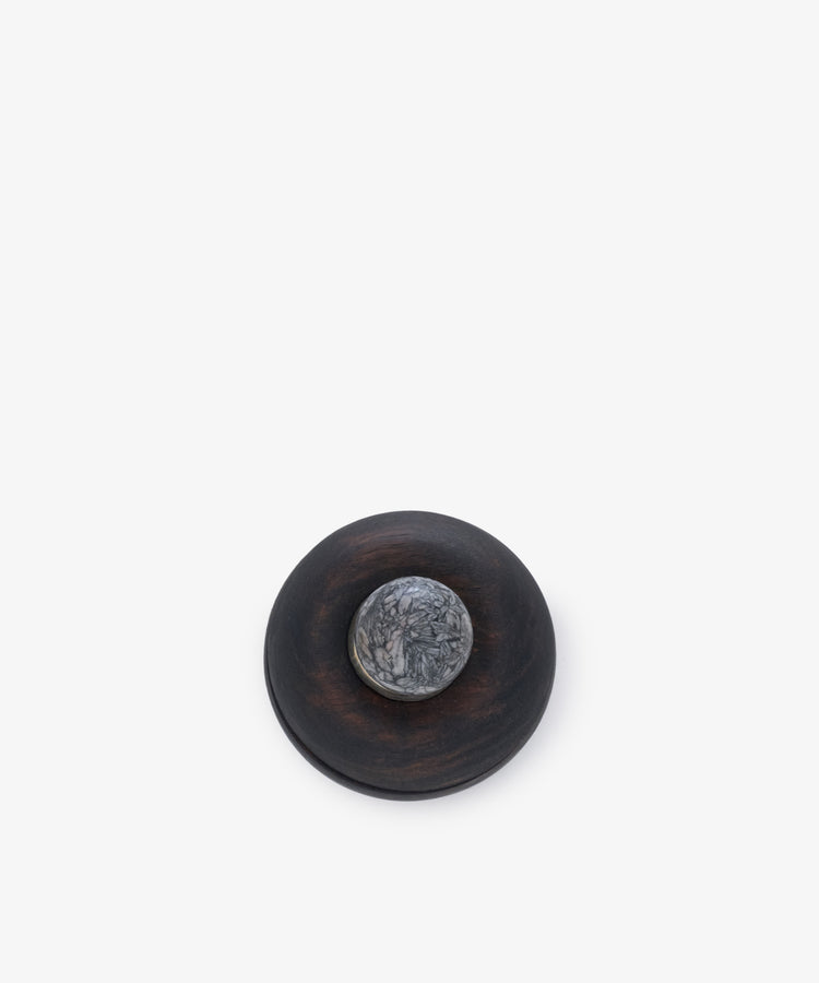 The Curiosity Box 15 is a round African wood box featuring a smaller marbled gray stone circle on top, displayed on a plain white background.