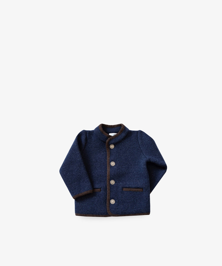 The Austrian Wool Jacket is a navy blue merino wool children's jacket with a Nehru collar, brown trim, front buttons, and two front pockets, shown against a plain white background.