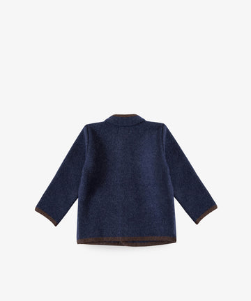 The Austrian Wool Jacket is a navy blue children's jacket with long sleeves, brown trim on cuffs and hem, and a classic Nehru collar, shown from the back against a white background.