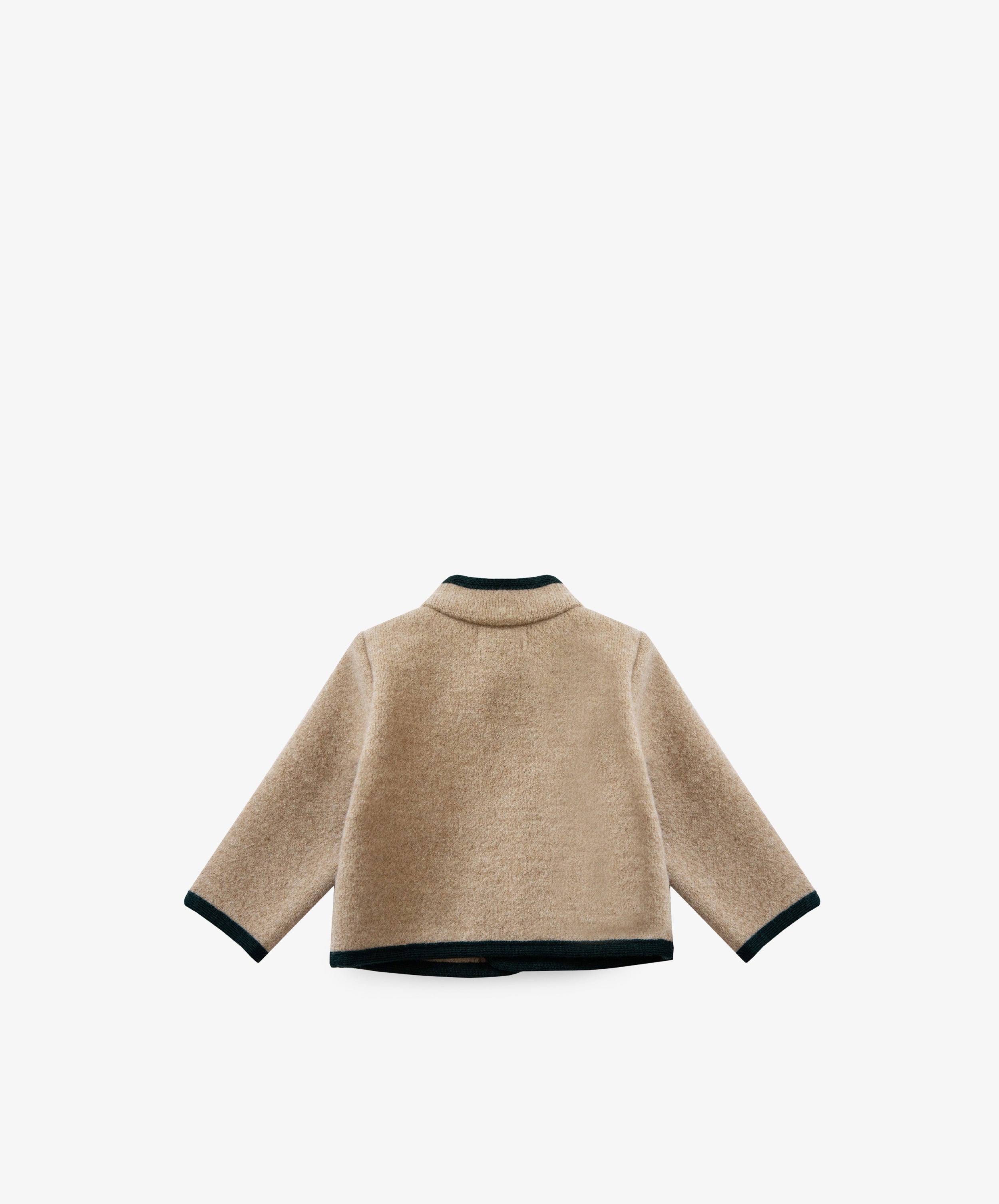 The Austrian Wool Jacket is a beige long-sleeve jacket with black trim on the collar, cuffs, and hem. It features a Nehru collar and is shown from the back against a white background.