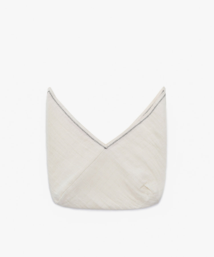 A set of 2 Filial Bread Bento napkins, white with black stitching on the upper edge, is folded into standing peaks on a plain white background to highlight their soft, Japanese linen-like texture.