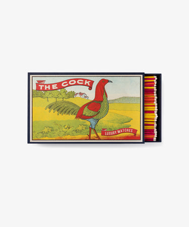 The Giant Cock by Archivist Gallery. Colorful illustrated matchbox with rooster and red, yellow and orange matches.