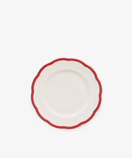The Petalo Small Plate, Set of 4 by Bitossi Home features white Italian ceramic with scalloped edges and a red border, displayed on a plain white background.
