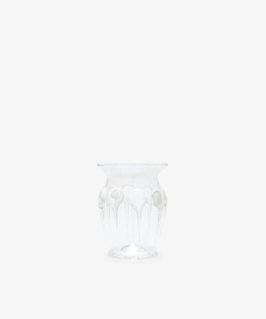 The Carlotta Vase features Bohemian artistry with a decorative pattern, mouth-blown form, and wide opening, beautifully displayed against a plain white background.