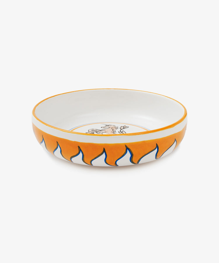 Palio Pasta Bowl in white glazed ceramic with orange and blue accents and tower and unicorn motif, side view.