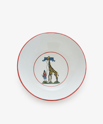 Palio Serving Bowl. Large white glazed ceramic bowl with red accents and giraffe motif. 