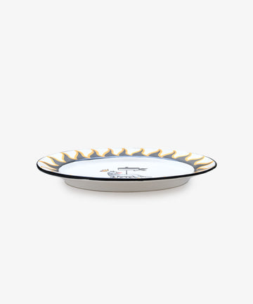 Palio Serving Platter. Glazed ceramic oval plate in black and yellow designs with wolf motif, side view.