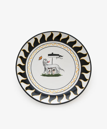 Palio Round Serving Platter. Large white glazed ceramic plate with black and orange accents and wolf motif. 