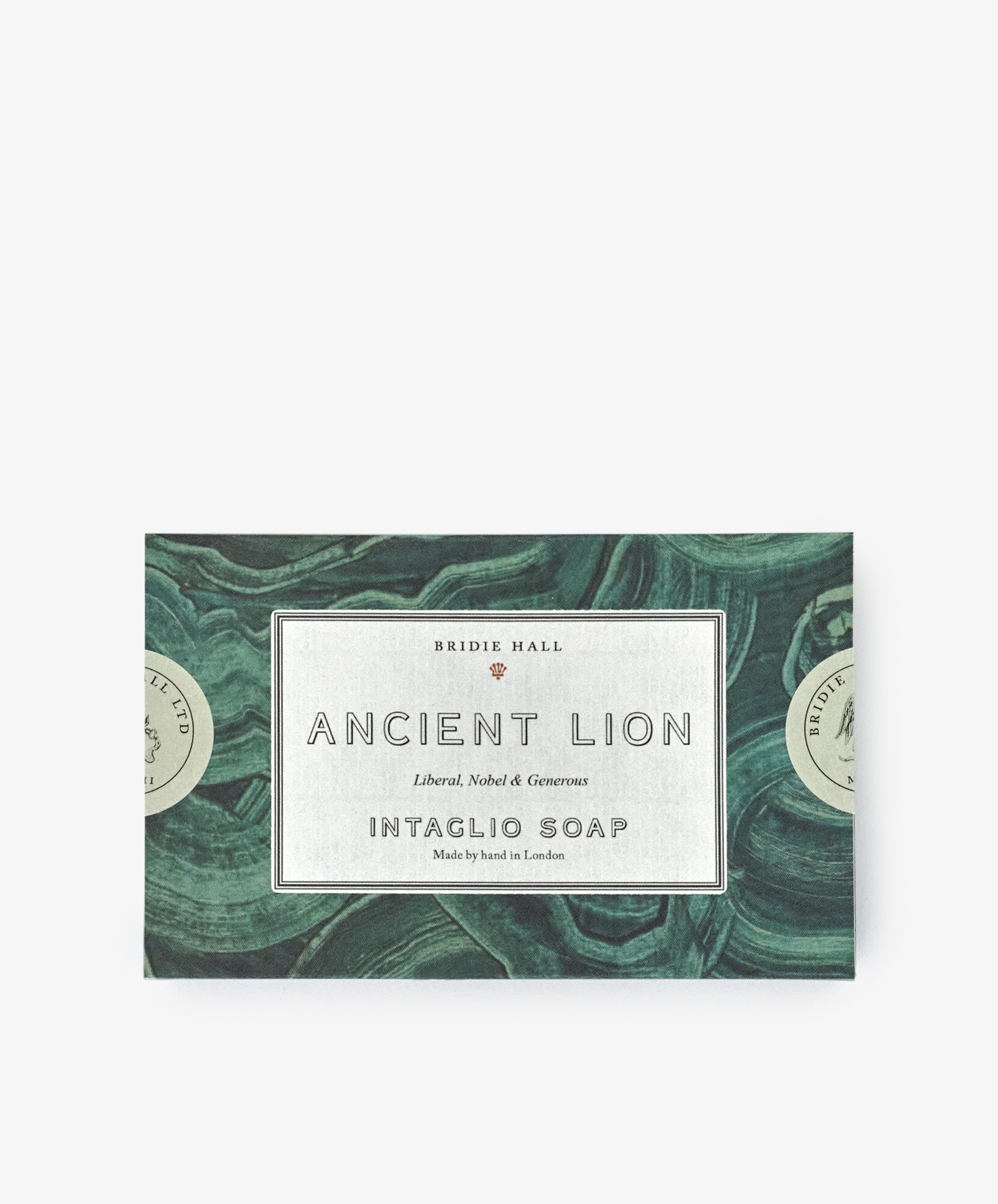 A rectangular soap box labeled Ancient Lion Soap, featuring a green marbled design with a white center label.