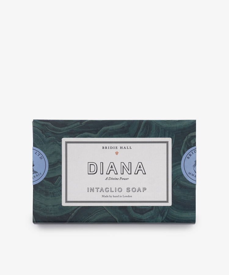 A set of two rectangular green neoclassical Diana Soap bars, each featuring a white Bridie Hall Diana Intaglio label and two blue circular seals on the sides.
