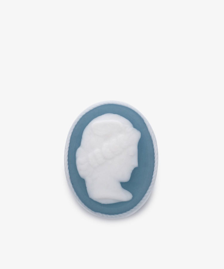 A set of two Diana Soaps featuring a blue and white cameo design with the classical profile of a woman’s head, reminiscent of traditional intaglio brooches, showcased against a plain background.