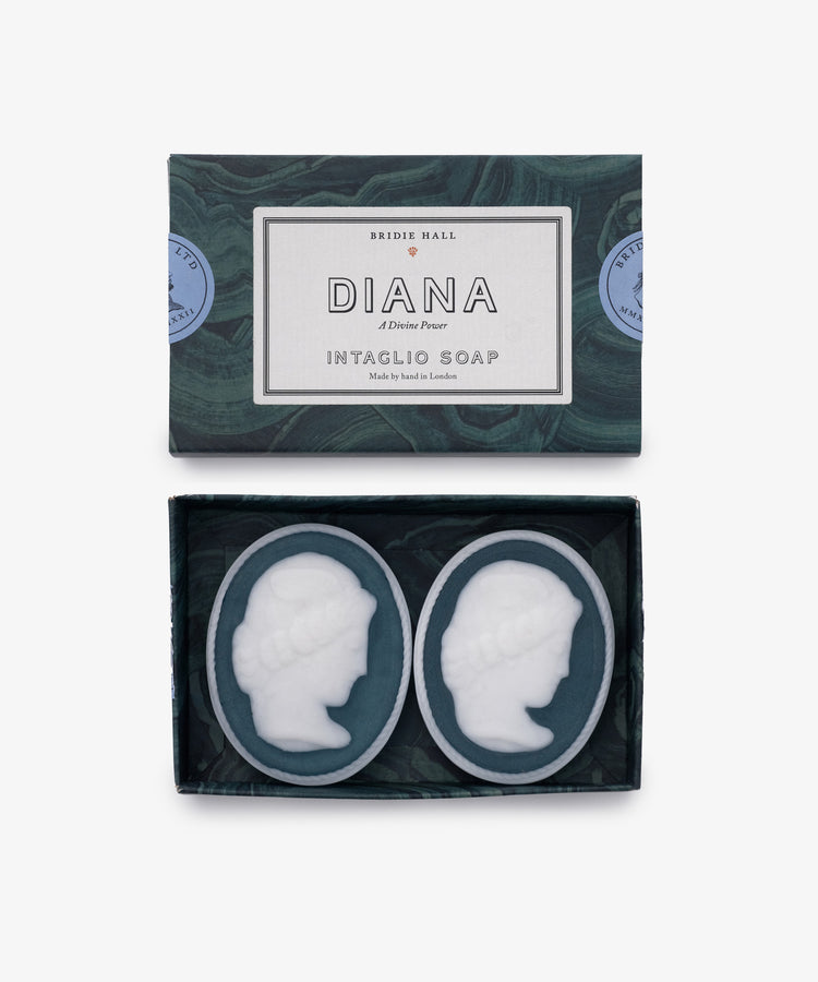 The Diana Soap, Set of 2, features two oval neoclassical soaps with a raised woman's profile in classical style—an elegant addition to any luxury bathroom.