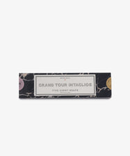 A rectangular black and white marbled box labeled Grand Tour Collection of Intaglio Soaps, Set of 5, inspired by classical cameos, is displayed against a white background.