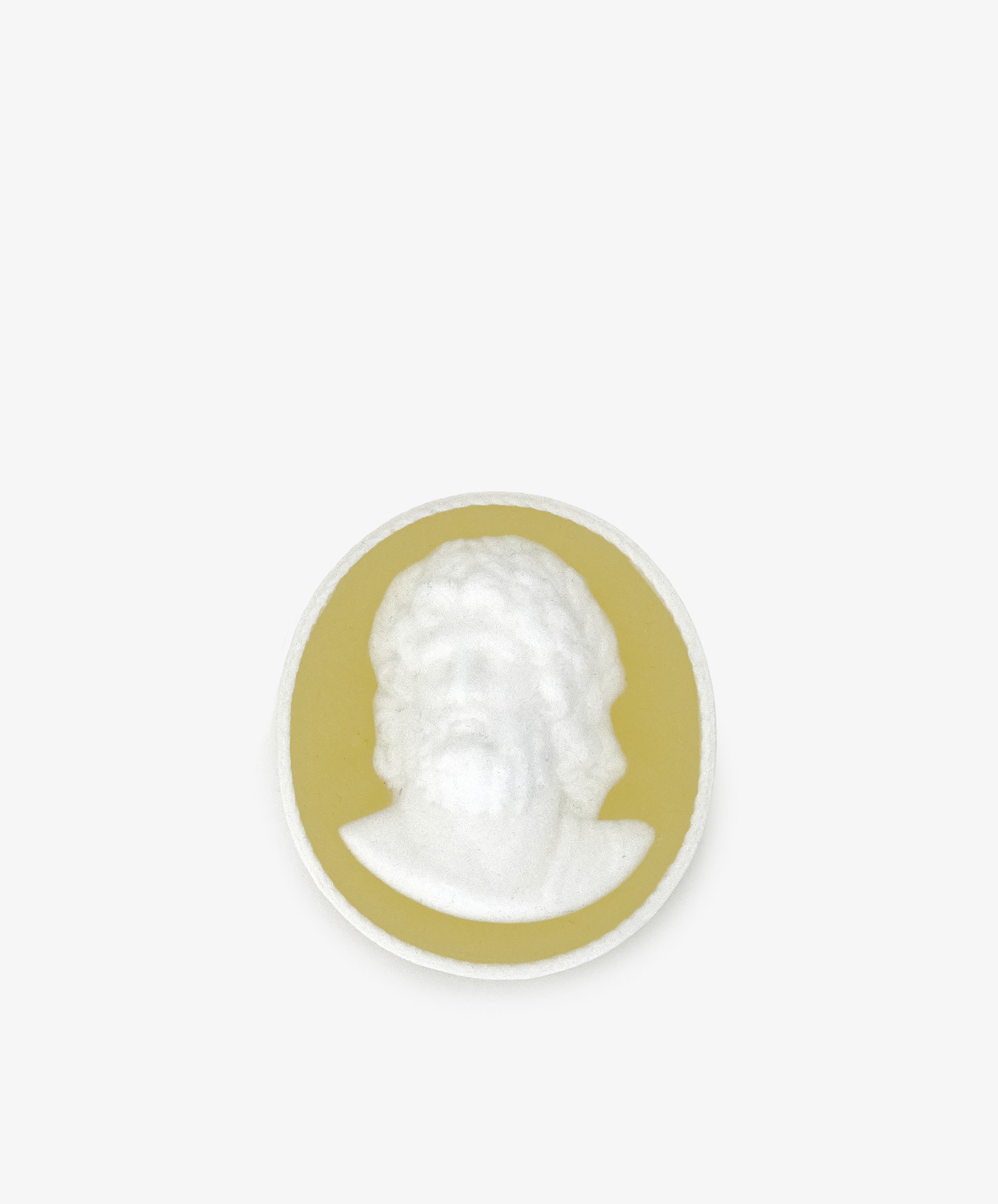 A round Hercules Soap featuring a white cameo relief of a bearded man's head and shoulders, set on a yellow background against a plain light surface.