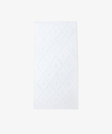 The Gaia Floor Mat is a white, rectangular floor mat featuring a diamond-textured design and made from recycled fabric, shown on a plain white background.