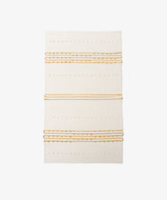 Gaia Floor Mat: A rectangular off-white rug with horizontal mustard yellow stripes and dotted textured patterns, handwoven from recycled fabric in the spirit of Portuguese tradition, shown on a white background.