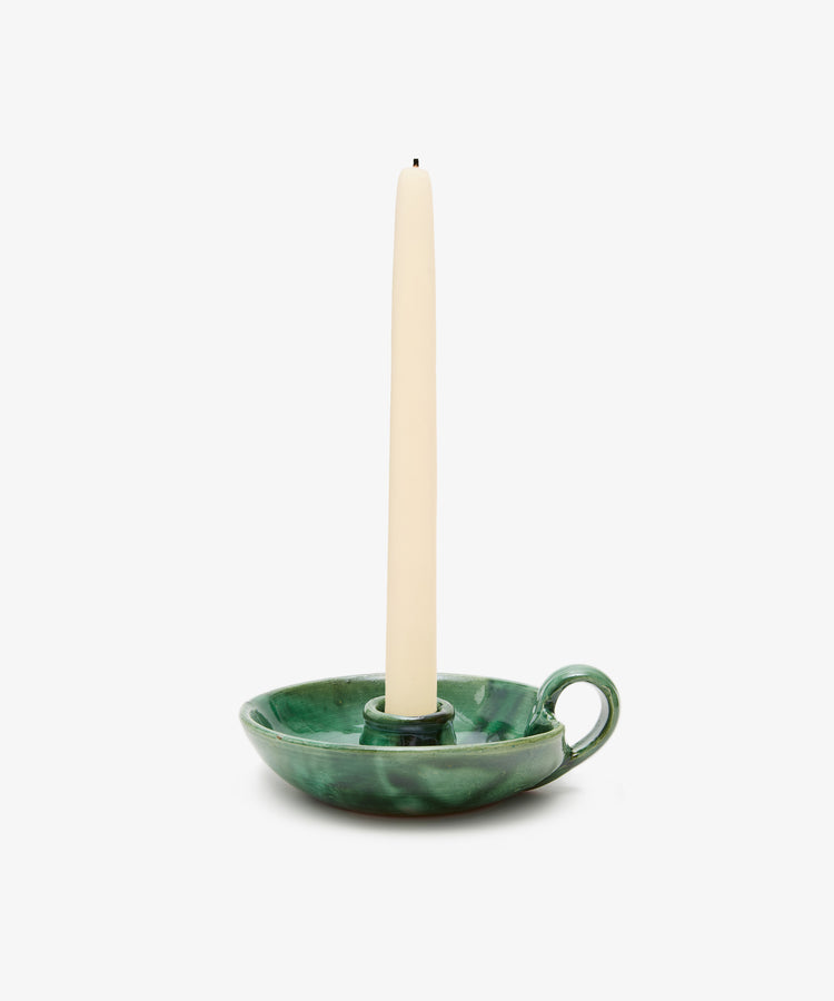 Balea Candle Holder. Green glazed ceramic candleholder dish with small handle and white taper candle.