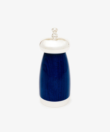 The Giorgio Pepper Mill, with Italian design in blue and silver, features a rounded body, a silver top knob, and a silver base. It stands upright on a plain white background.